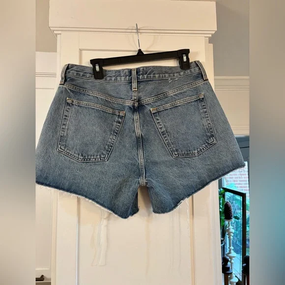 new Agolde Parker long denim shorts in Skywave medium light wash